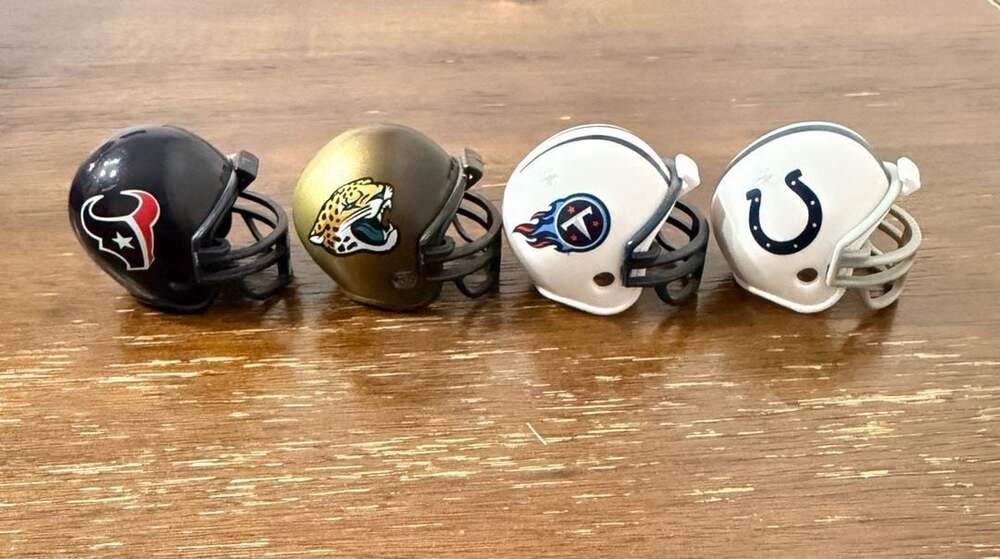 Lot of 4 NFL Mini Pocket Pro Football Helmets (Texans, Jaguars, Titans, Colts)